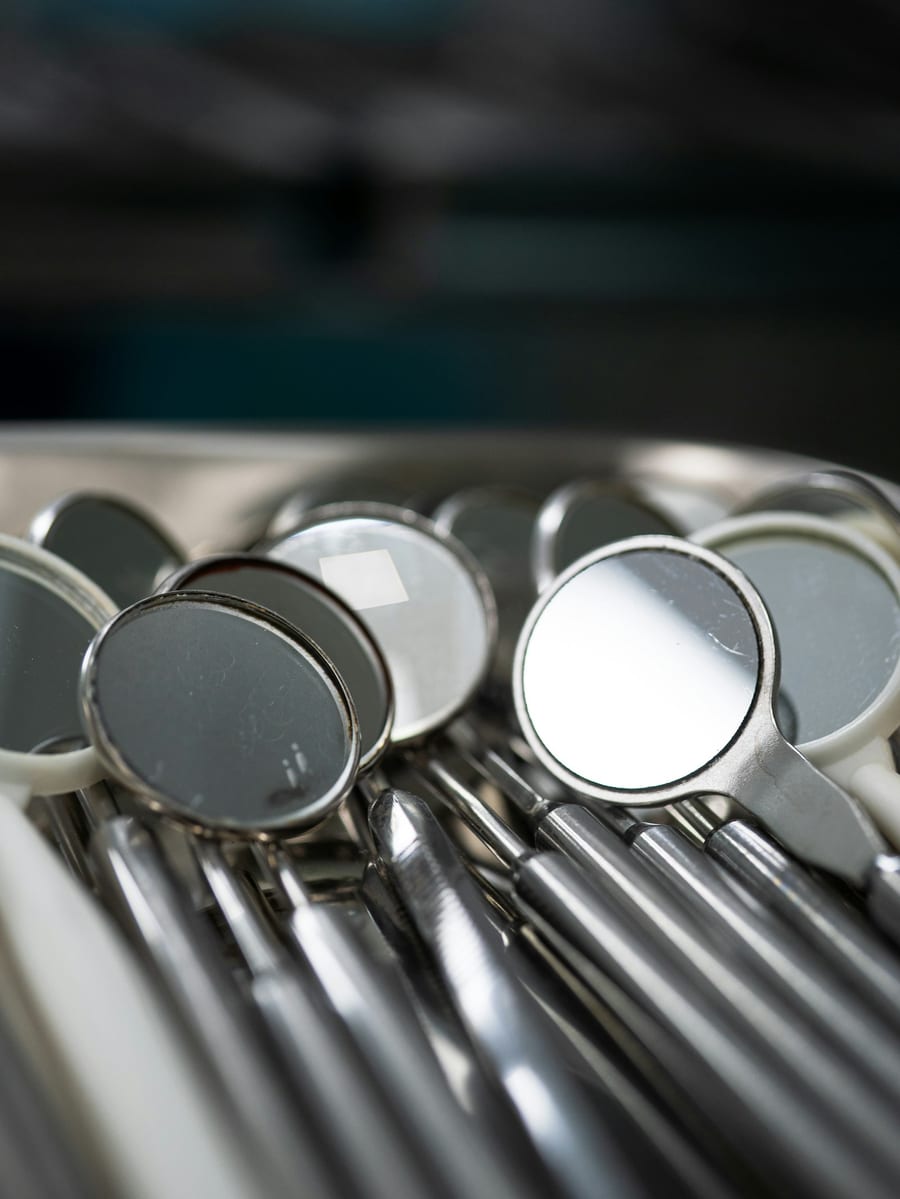Dental instruments laid out on a sterile tray